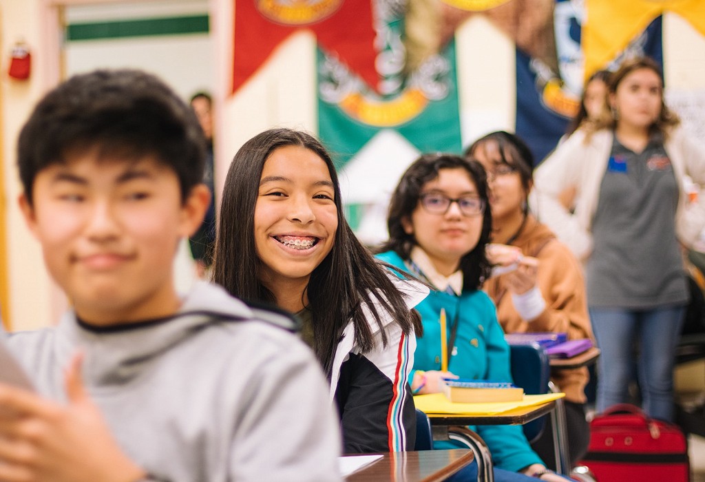 smiling teenagers in class